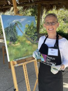 Naples Art District member Jill Gordon paints outdoors at the Naples Botanical Garden. Photo courtesy of the Naples Art District