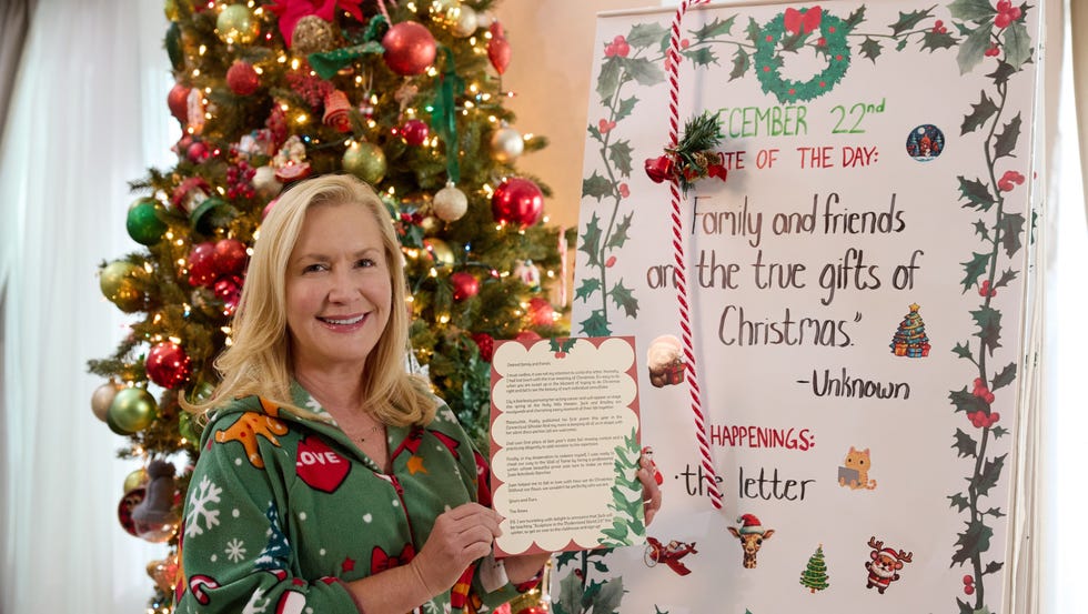 Woman holds a letter