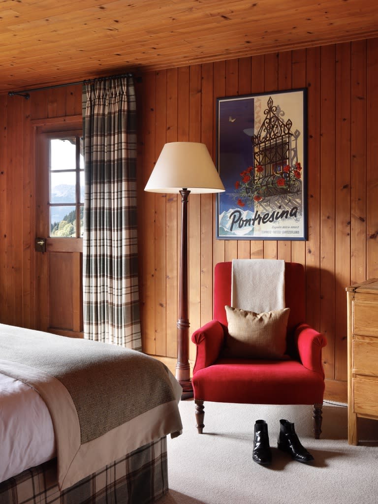 A wooden bed in a chalet