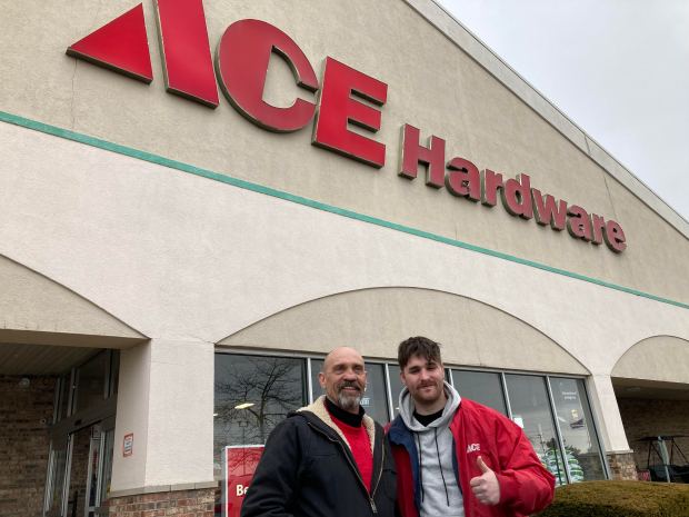 Employee of Crete Ace Hardware John Minerd, Links and Adam Kroll outside of the business on February 11, 2025 (Mike Nolan/Daily Southtown)