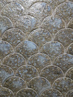 Pai Pai by Natucer features a pebbled, antique look in a distinctive scallop shape.