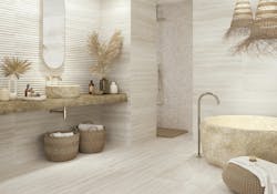 Grupo Halcon Ceramicas showed a mastery of neutral tile options at their primary stand and in their brand displays. The company also showcased the soothing and welcoming embrace of neutrals in a bath application image from the Emotion brand, where tiles in multiple sizes, orientations, and reliefs are incorporated to maintain the flow of the room while providing visual interest.