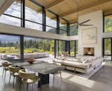 Sinking lift-and-slide glass walls on both sides of the large space blur the boundaries between interior and outdoor space. "Fresh air moves through the house pretty much all year round," says Bob. "Even in winter we opened windows because we achieve so much solar gain from the glass amount and the reflection of the snow."