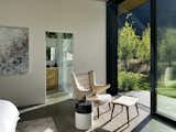 A reading corner in the primary bedroom suite benefits from direct access to the terrace.