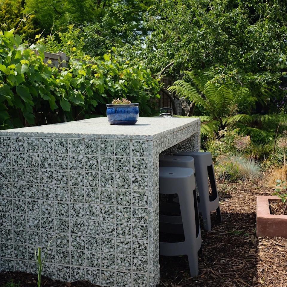 The island in kitchen style that Jess tiled with her father Mike