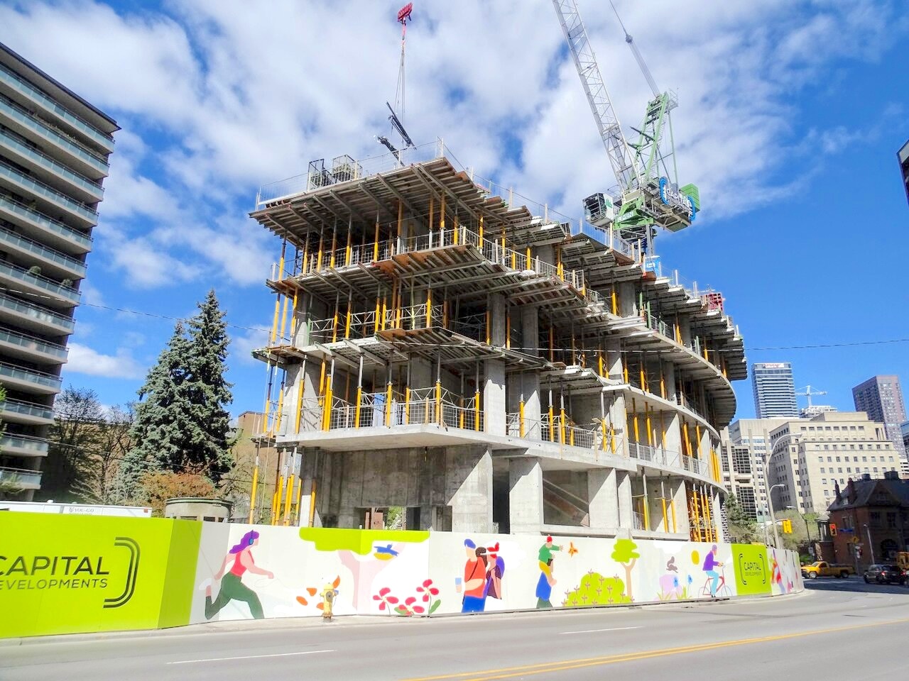 The building climbs over the class in Yorkville's Curving Tower