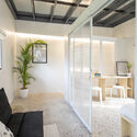 Sienna net -zero home / billion dollar bricks - inner photography, wood, lighting, glass, chair