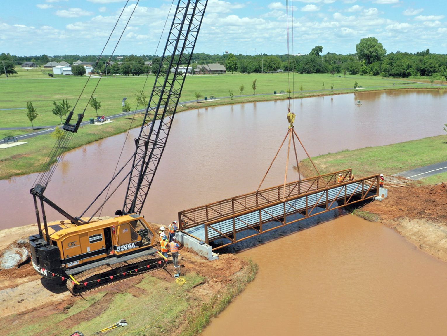 A new bridge in Veterans Park opens the way to play