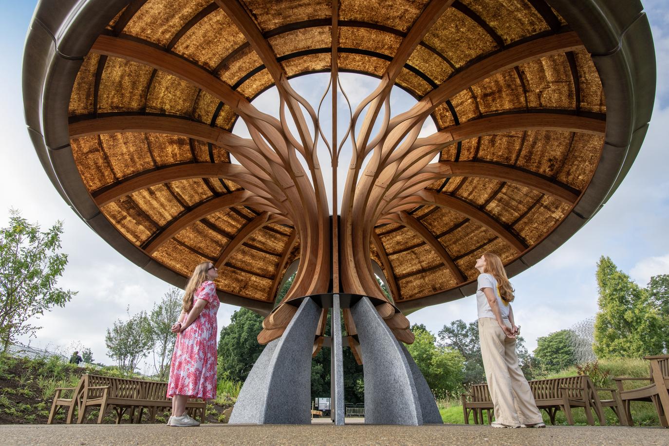 There is a striking architectural heart in the heart of the garden: a canopy pavilion that is inspired by the branching networks of mushrooms.