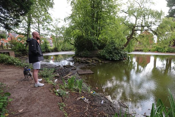 Cllr David Leatherbarrow on Moss Side Lake, who is part of the poppy field Fields Estate in Maghull