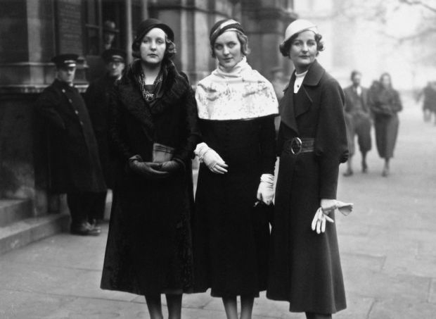 In this photo from 1932, three of the Mitford Sisters visit at a wedding. (LR): Unit Mitford; Diana Mitford and writer Nancy Mitford. (Photo by Hulton Archive/Getty Images)