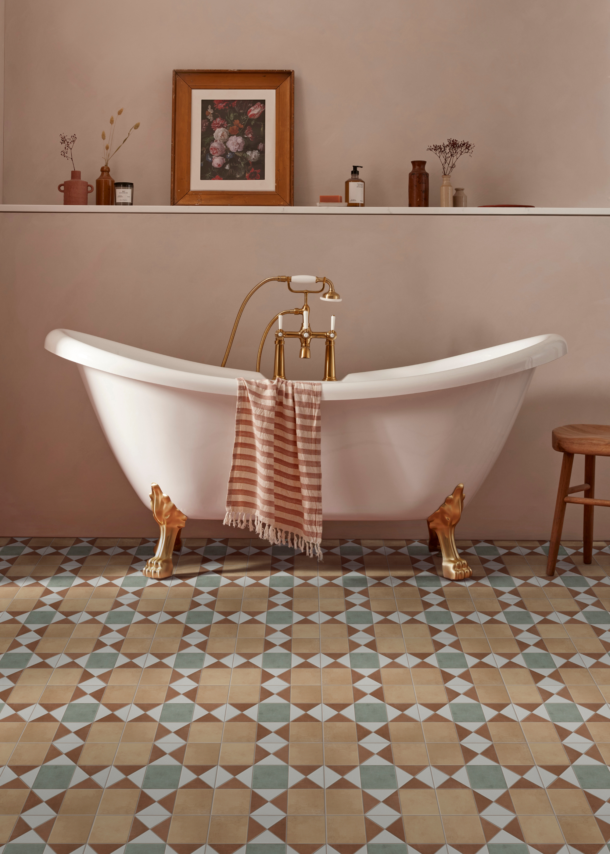 A classic bathroom with free -standing tub and tiled soils