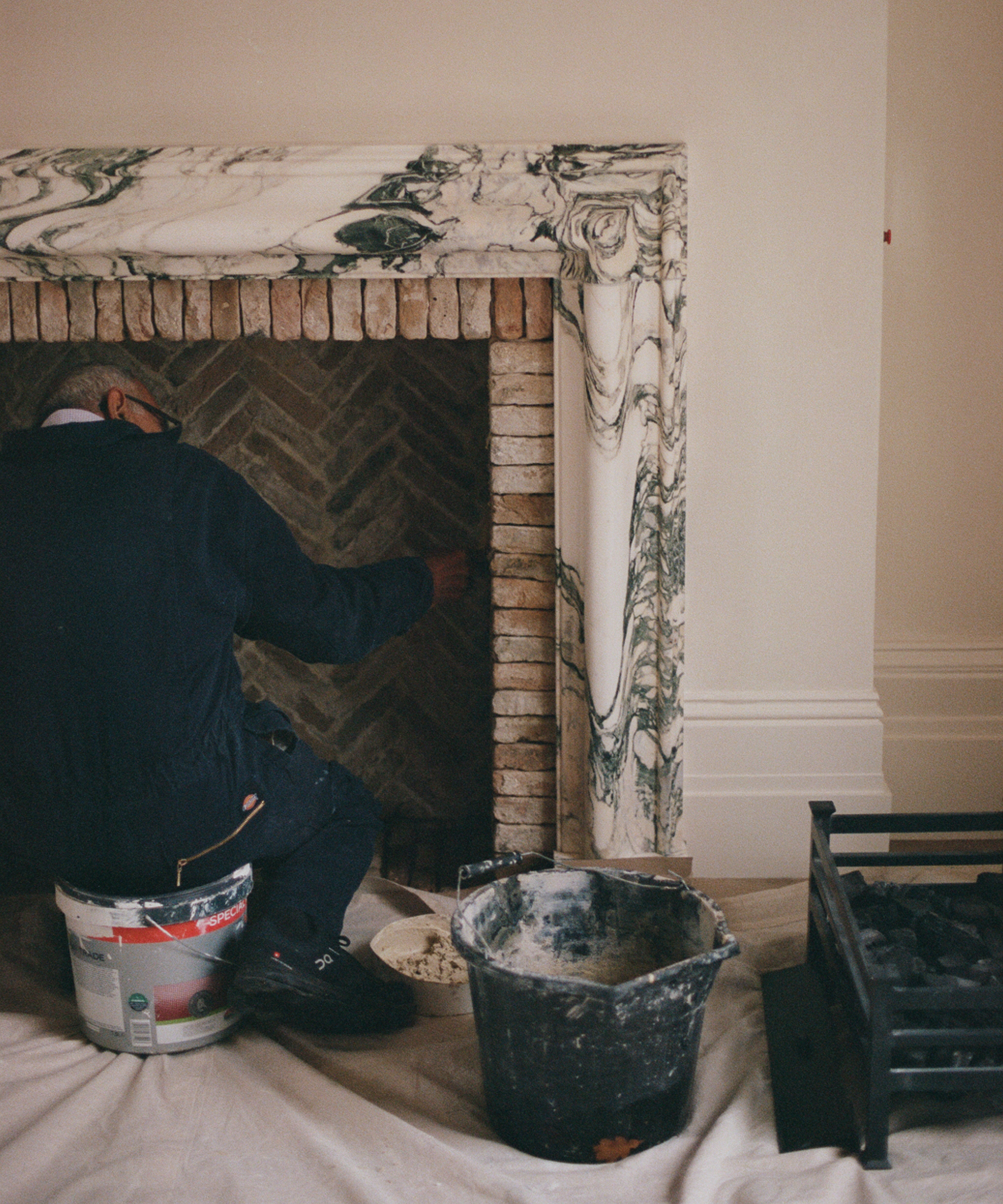 Marble fireplace, which is flied on site