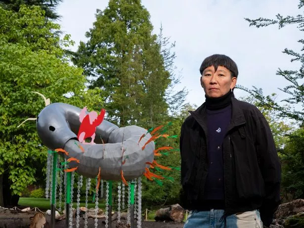 The snail on me sculpture by Anne Duk Hee Jordan