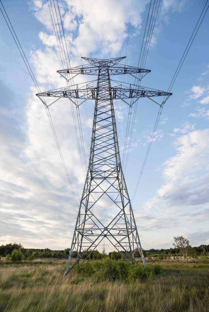 Picture of representation. Credit: Canva Low angle photo of the gray gear tower