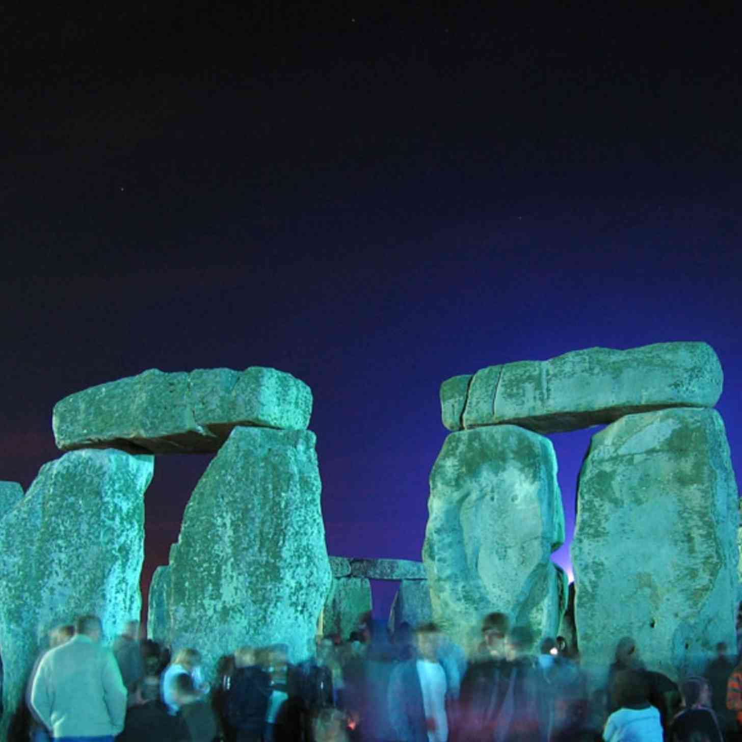 Stonehenge at night, with a lot of people who have passed