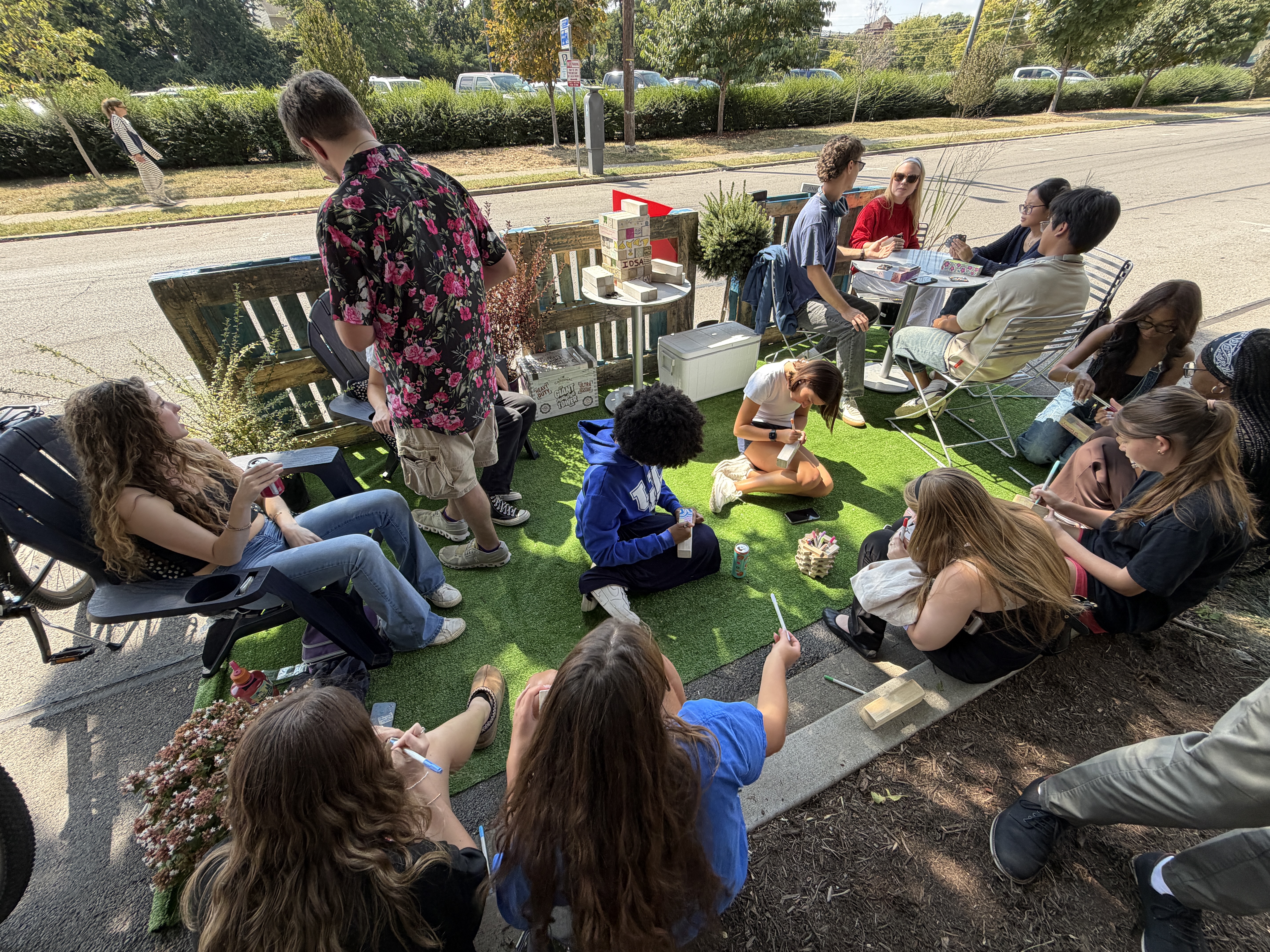 Organizers invited participants to decorate their own Jenga block, which then assembled into a full Jenga tower at the end of the event, becoming a built object that symbolized the event's communal theme. Photo provided by Haley Simpkins.