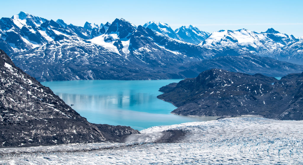 Charter yacht Aqua Lares for the solar eclipse in Greenland, with an astronaut