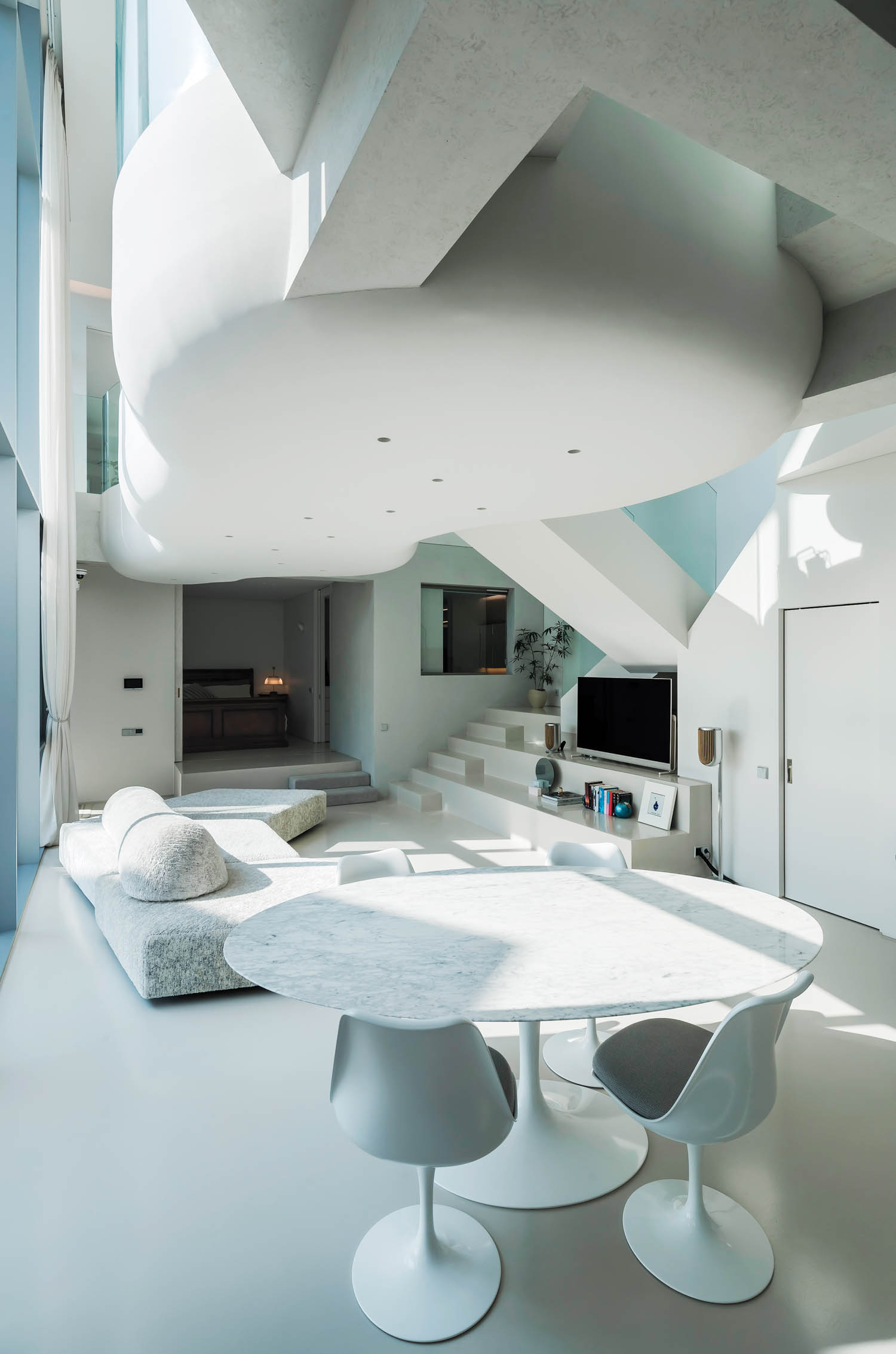 Dining area with all white furniture