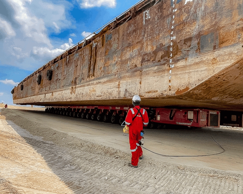 Mammoet completes complex salvage and stacking of barge for Singapore polder project